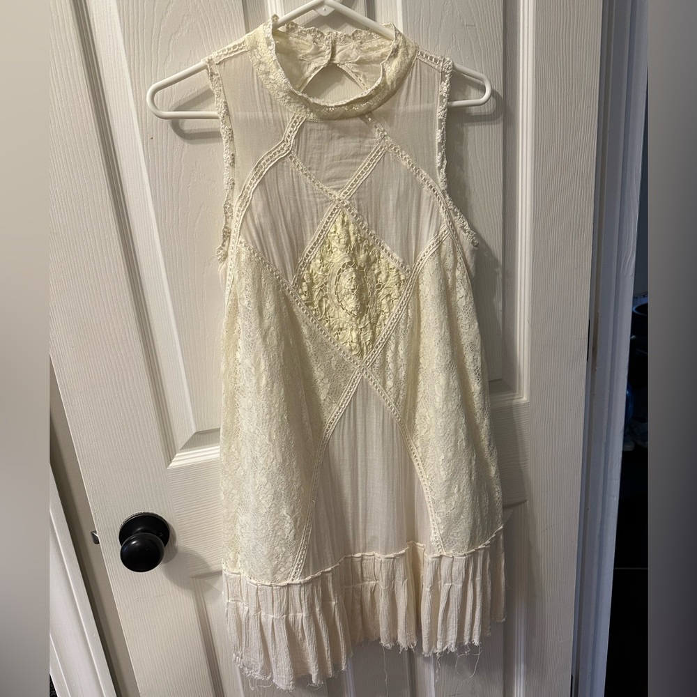 High neck, keyhole back free people tunic! Size: small, color: ivory.